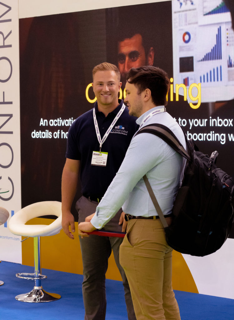 Econform - Careers A picture showing two people at an event